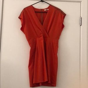 Cute orange dress with gray studs on shoulders